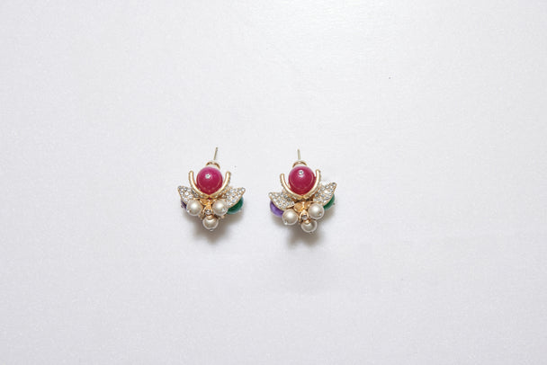 Stud earrings with rhinestone, natural stone, and glass pearl