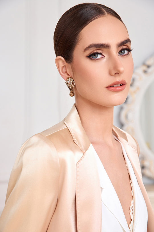 Gold-plated floral stud earrings