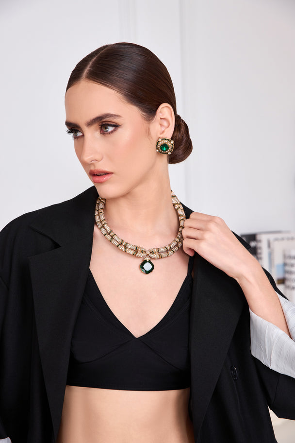 Layered necklace with emerald green pendant