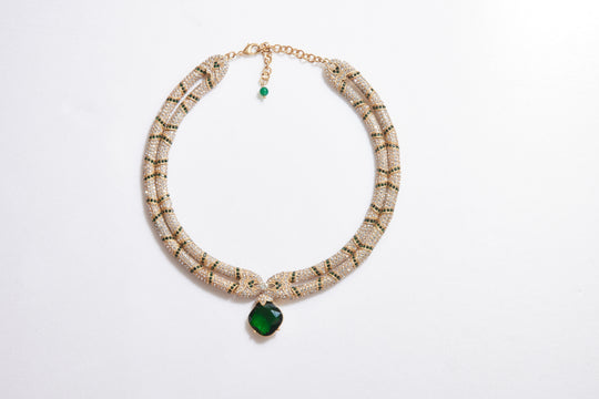 Layered necklace with emerald green pendant