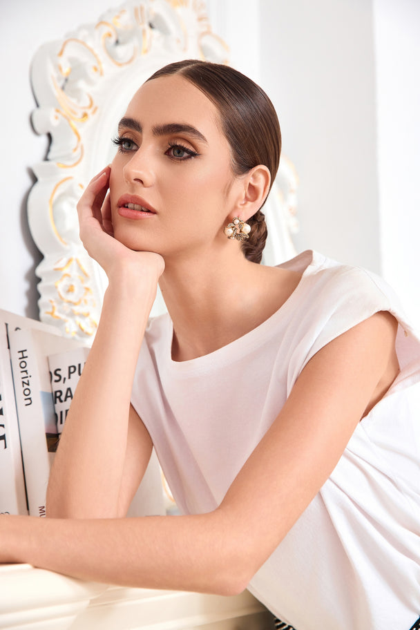 Elegant stud earrings with glass pearl accents