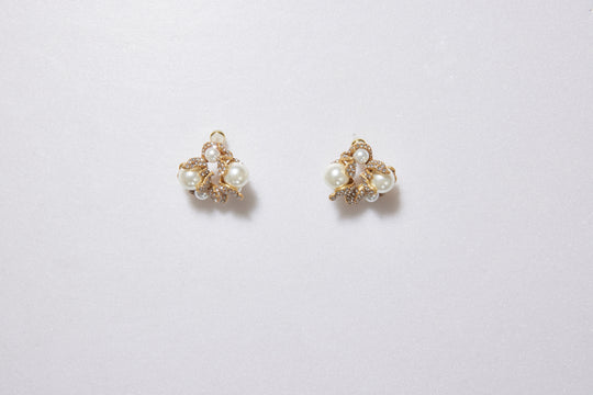 Elegant stud earrings with glass pearl accents